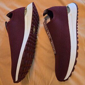 Brand new, never worn Michael Kors slip on Tennis Shoes size 7